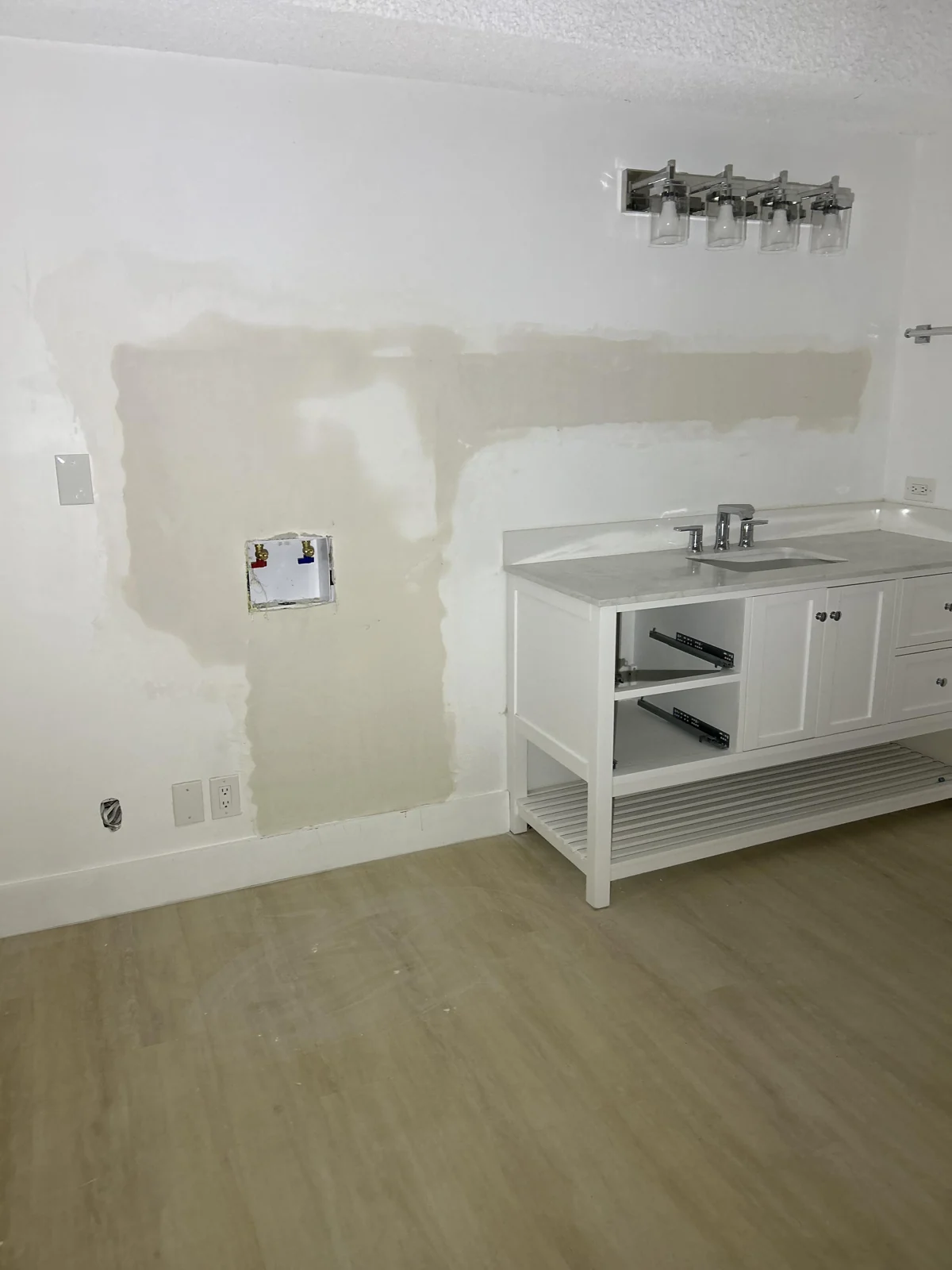Bathroom vanity and faucet from a supplied 1st Choice project